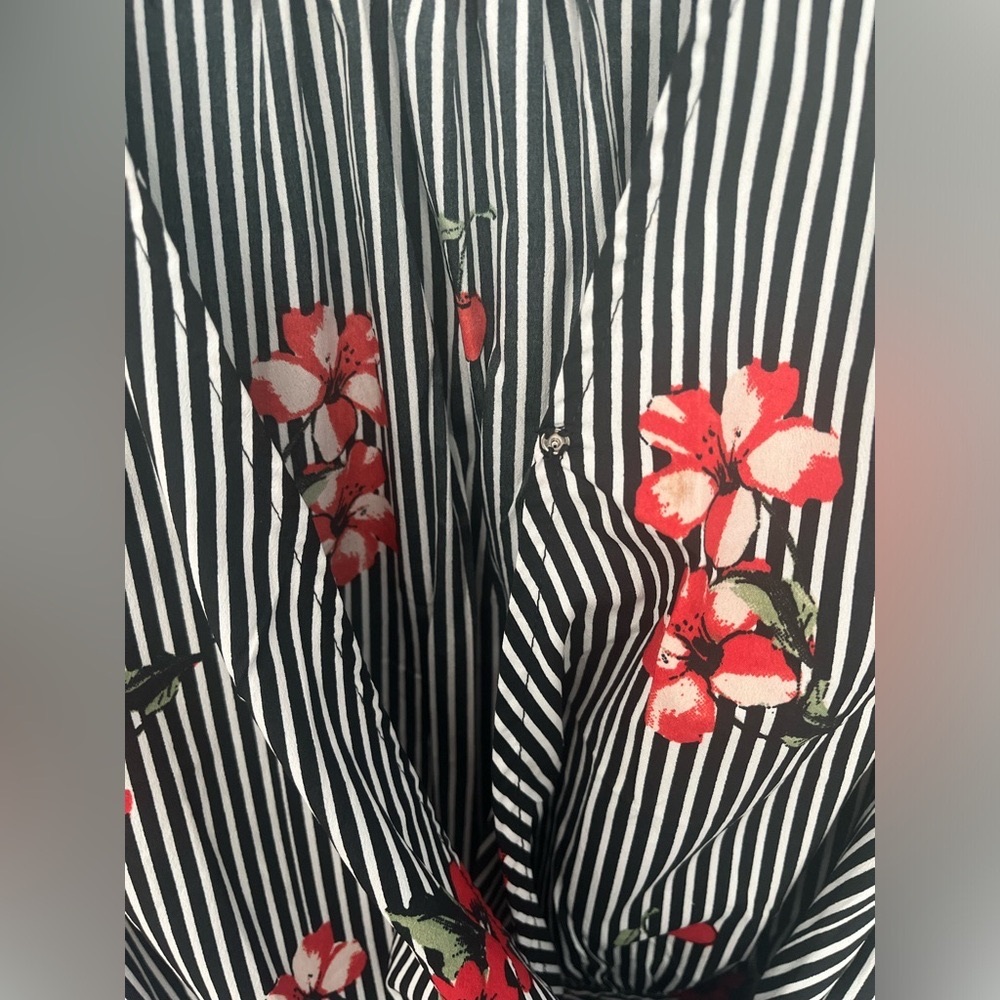 Beautiful multi colored blouse. Size M like new.